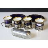 Four Aynsley Cabinet Coffee Cans with Saucers, cobalt blue with gilt highlights, all the cans held
