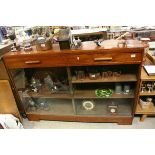 Mid 20th century Oak Side Cabinet comprising Two Drawers over Two Large Glass Sliding Doors