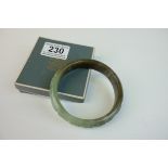Spinach Jade Bangle with carved design to outer rim, 9cms diameter