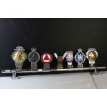 Seven Vintage Car Badges mounted on Tubular Bracket including Singapore AA Badge, Notts & County,