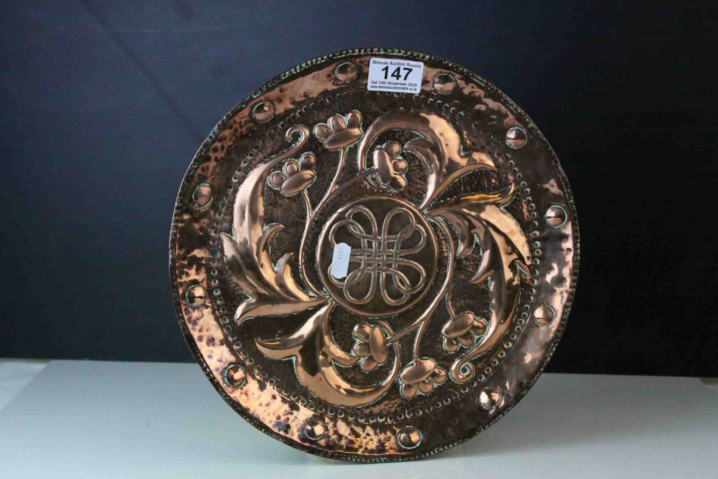 Arts and Crafts John Pearson Copper Circular Tray, flower and foliage repousse decoration , marked