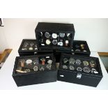 A large quantity of gents wrist watches as new in five cases.