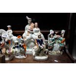 Collection of Thirteen 19th century Staffordshire Figures, Spill Vases and Flatback, largest 35cms