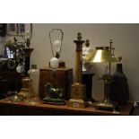 A group of lamps to include a lace makers lamp Corinthium column painted lamp,oriental tea