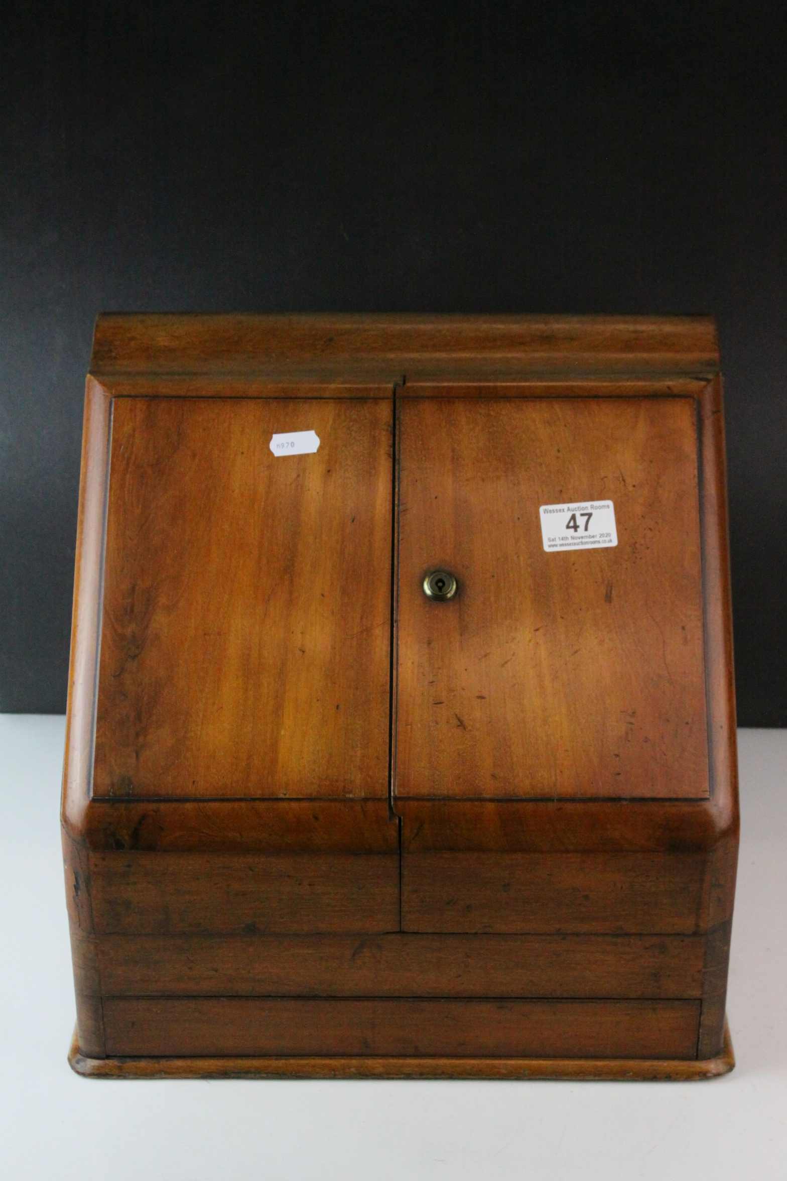 Victorian Mahogany Stationery Cabinet, the sloping front with two doors opening to reveal a fitted