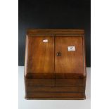 Victorian Mahogany Stationery Cabinet, the sloping front with two doors opening to reveal a fitted