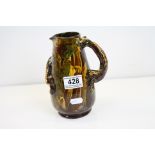 Longpark (Torquay) Early 20th century slipware Lizard Jug with dragon hanle, 18cms high