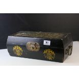 Oriental Black Lacquered Box with Brass Clasps and Handles, the lid decorated with Three Seated