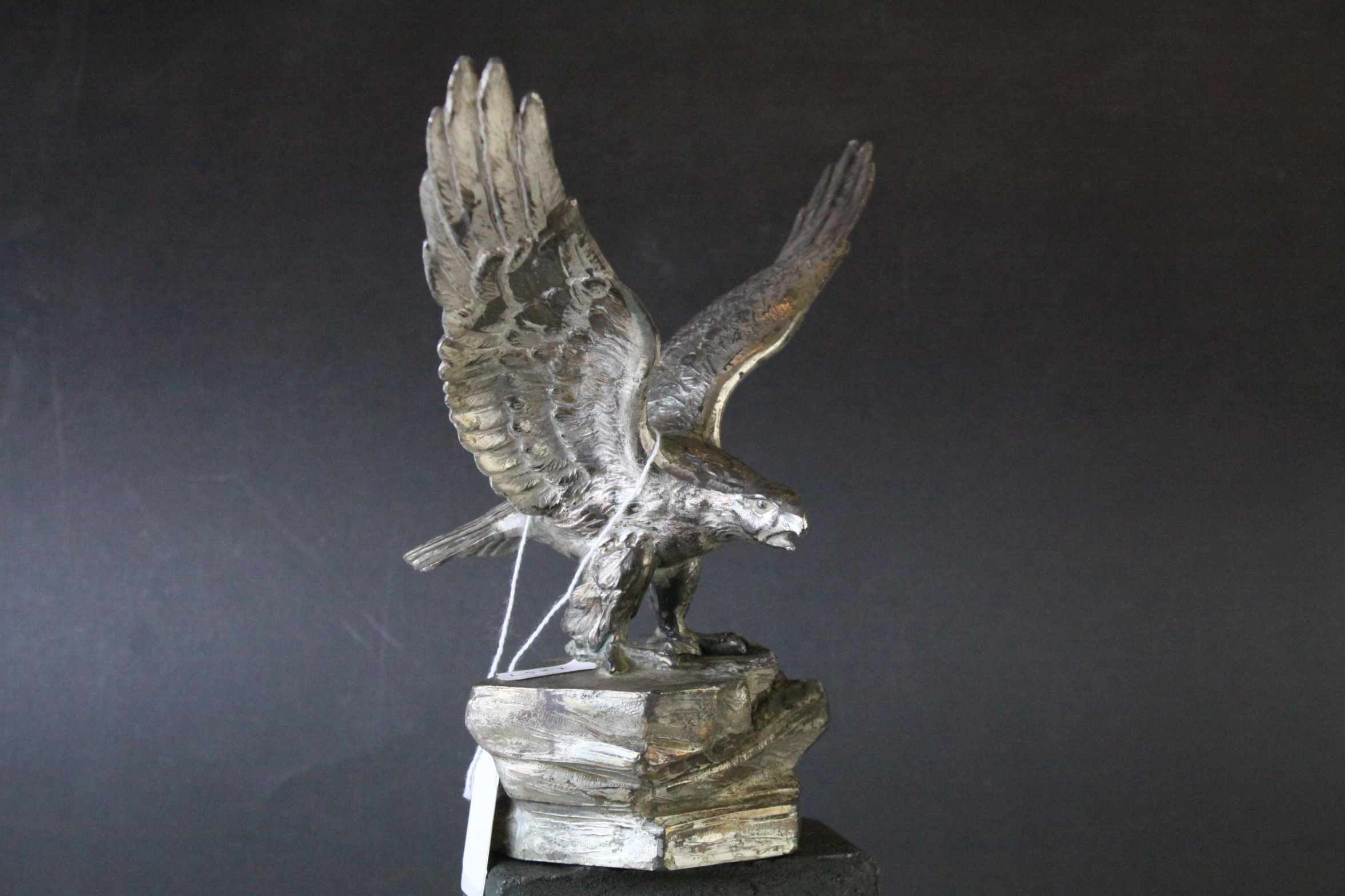 Sculpture of a Silver Plated Eagle on a Rock