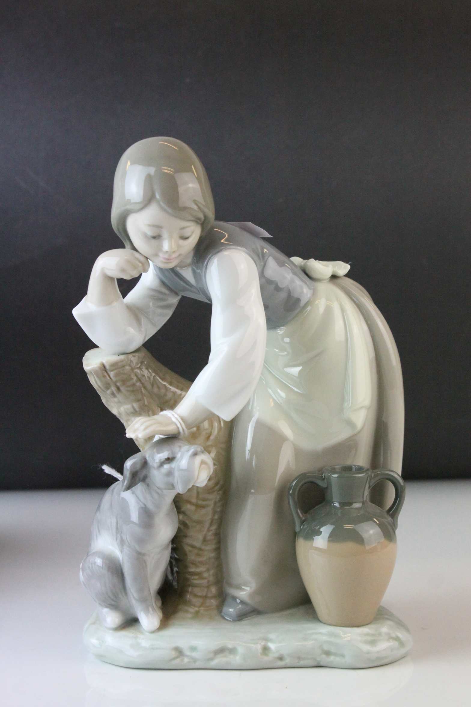 Two Lladro Figures, Caress and Rest, model no. 1245, 21cms high and a Seated Girl holding Flower - Image 7 of 10