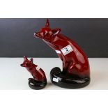 Large Royal Doulton Flambe Seated Fox, 24cms high together with a Smaller Royal Doulton Flambe