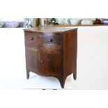 Early 19th century Mahogany Bow-front Washstand with single drawer above a two door pot cupboard,