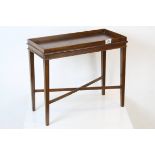 Small Mahogany Table with Galleried Top raised on square tapering legs with cross-stretcher, 52cms