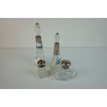 Two Early 20th century Silver Collared and Glass Perfume Bottles together with Two Dressing Jars