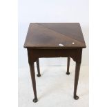 George III Mahogany Corner Table with single drop flap opening to produce a square surface, with