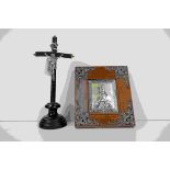 Wooden Ebonised Crucifix mounted with a White Metal Christ and raised on a plinth base, 19.5cms high