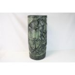 A ceramic pottery stoneware stick stand/vase with embossed decoration figures in a horse accident
