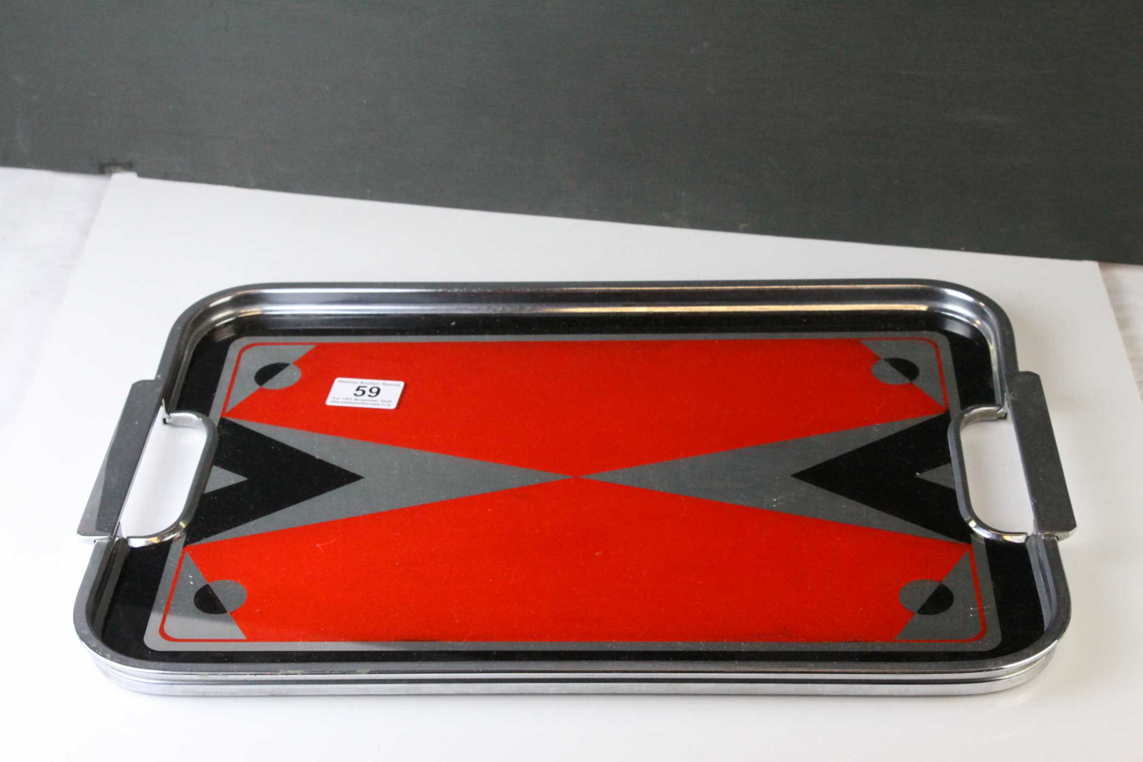 Art Deco Chrome Serving Tray, the glass mirrored panel with a red and black geometric design,
