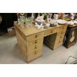 Victorian Pine Twin Pedestal Desk over an arrangement of nine drawers, 134cms long x 71cms deep x
