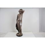 Tall Ceramic Nude Figure of a Woman holding a Robe, 55cms high