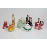 A group of Royal Doulton figures to include Lydia, Fair Maiden,This Little Pig, Grandpa's Story