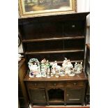 Early 19th century Oak Dresser, the shelved back above three drawers and two panelled doors with a