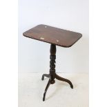 Early 19th century Mahogany Tilt Top Table with rectangular top, turned pedestal support and