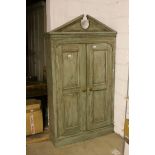 Painted Pine Cupboard with Break Neck Pediment, the Two Panel Doors opening to reveal Four