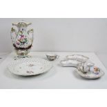 A Meissen cabinet plate floral decoration and pierced edge a Dresden chamber stick,a floral