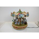 ' Mr Christmas ' Model Musical Light-Up Christmas Carousel, with power adaptor, 26cms diameter