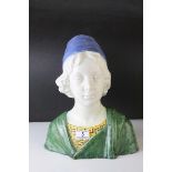 Glazed Pottery Bust of a Boy wearing a Blue Hat signed AVF or AMF, 34cms high