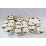 A quantity of Royal Albert Country Roses to include cups and saucers sugar bowl side plates etc.