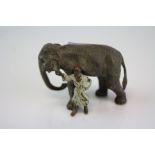 An Austrian cold painted bronze in the form of an Elephant and handler.