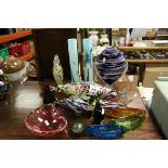 A group of glassware to include a signed iridescent frog paper weight signed PKS,four Murano fish,