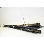 A quantity of coarse fishing rods to include Shakespeare Daiwa etc.