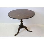 Georgian Oak Snap Top Circular Table, raised on a pedestal base with three splay feet, 84cms wide