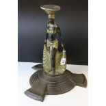 Art Nouveau Style Cast Iron Egyptian Revival Figural Stand raised on a circular stepped base,