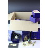 Twenty Boxed Atlas Edition Faberge Style Decorative Eggs together with Two Boxed Egg Spoon Display