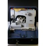 Cased ' Elna SU ' Electric Sewing Machine, with instruction booklet, 39cms long