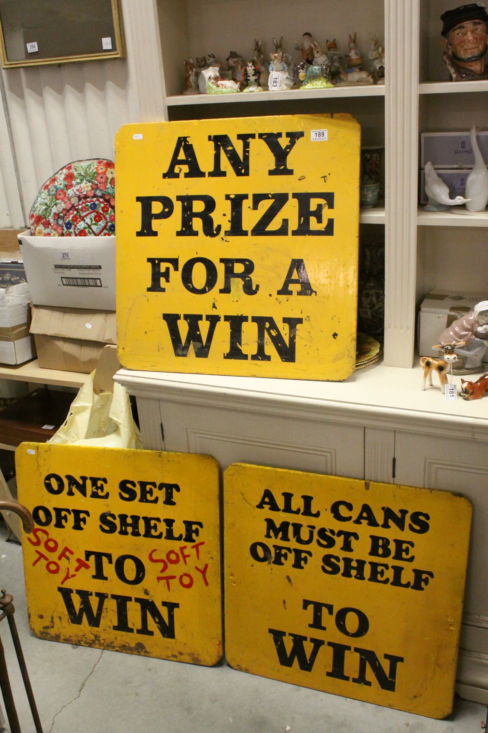 Three Mid 20th century Wooden Painted Fairground Signs including ' Any Prize for a Win', ' One set