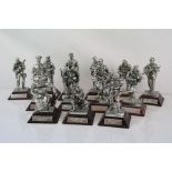 A collection of thirteen English Miniature metal military figures to include The Paratrooper, The