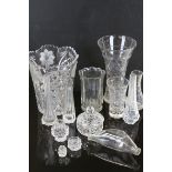 A quantity of mainly cut glass to include vases,dressing table parts sets etc.