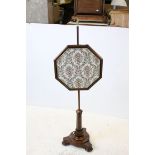Mid 19th century Rosewood Pole Screen, with brass finial and octagonal framed tapestry panel, raised