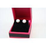 Pair of Silver and Opal Stud Earrings