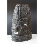 Carved Cambodian Wooden Sculpture with Face and Scrolling decoration, 41cms high