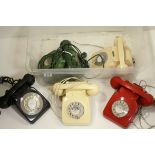 Five 1960s/70s telephones of various colours.