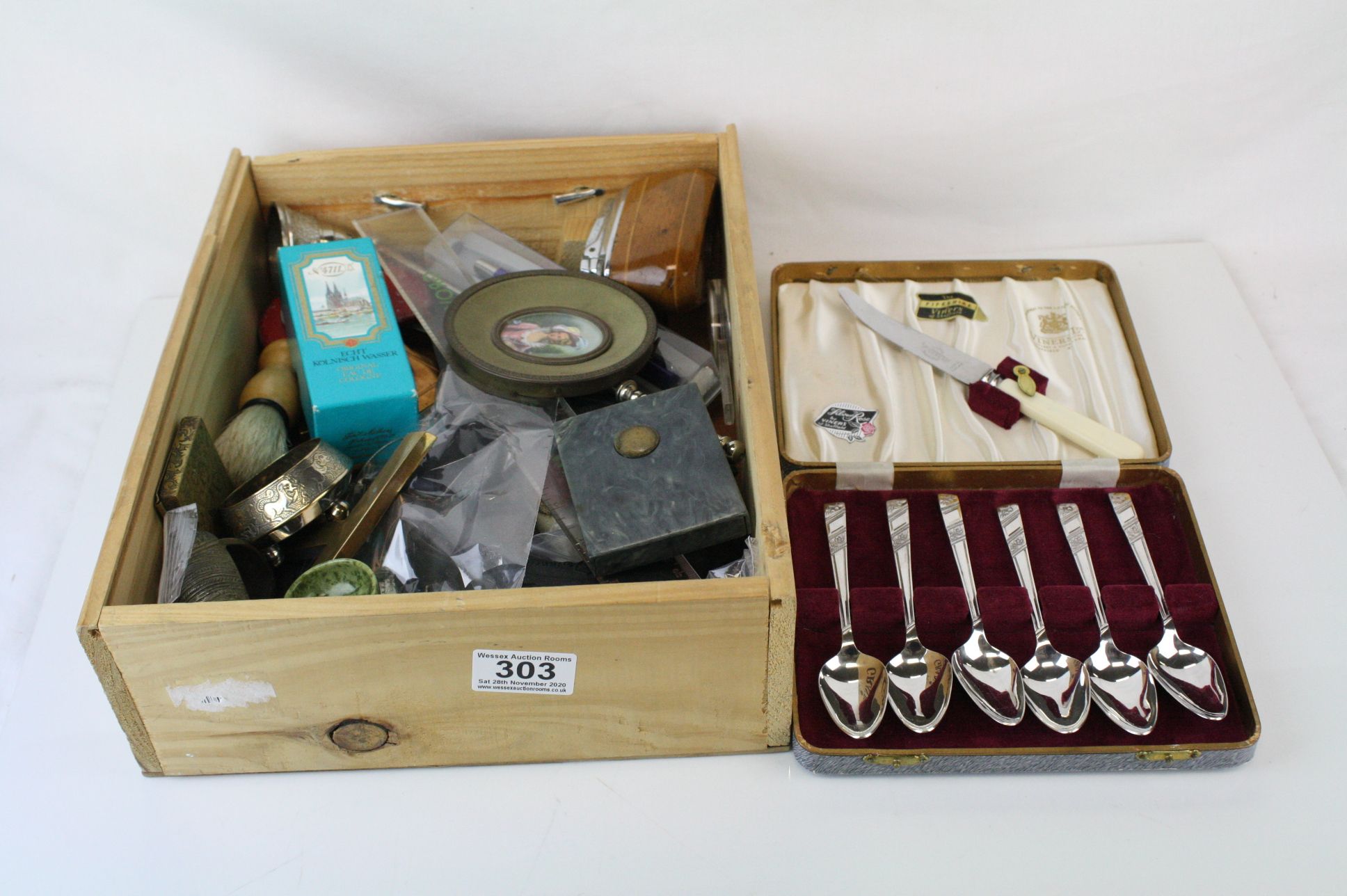 A box of mixed collectables to include Lighters, badges, glasses and pens.