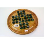 Vintage Solitaire Board with Dark Green Marbles