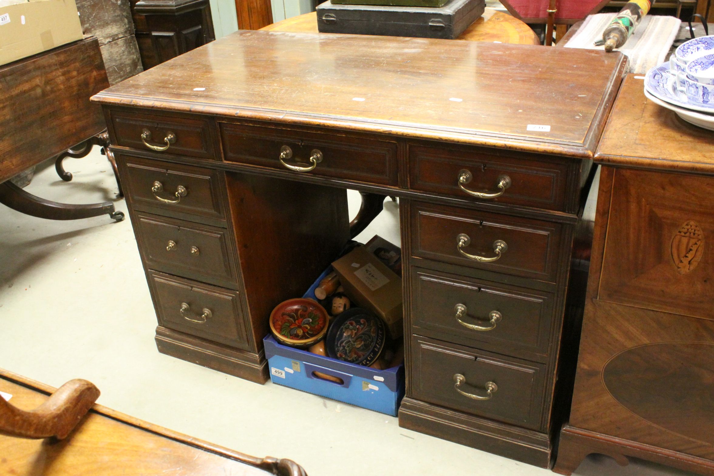 Victorian Mahogany Twin Pedestal Desk, with an arrangement of nine drawers, raised on plinth