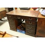 Victorian Mahogany Twin Pedestal Desk, with an arrangement of nine drawers, raised on plinth